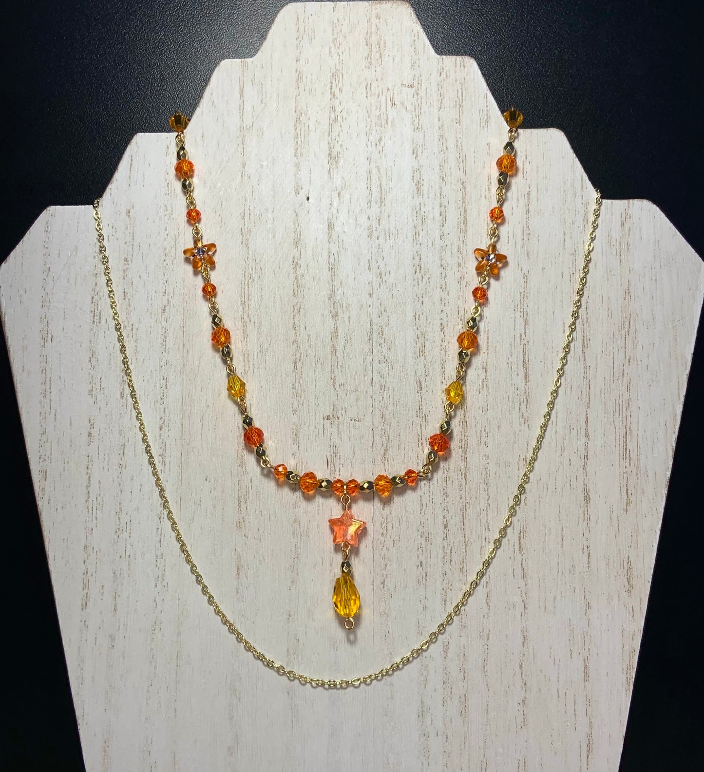 Orange star necklace